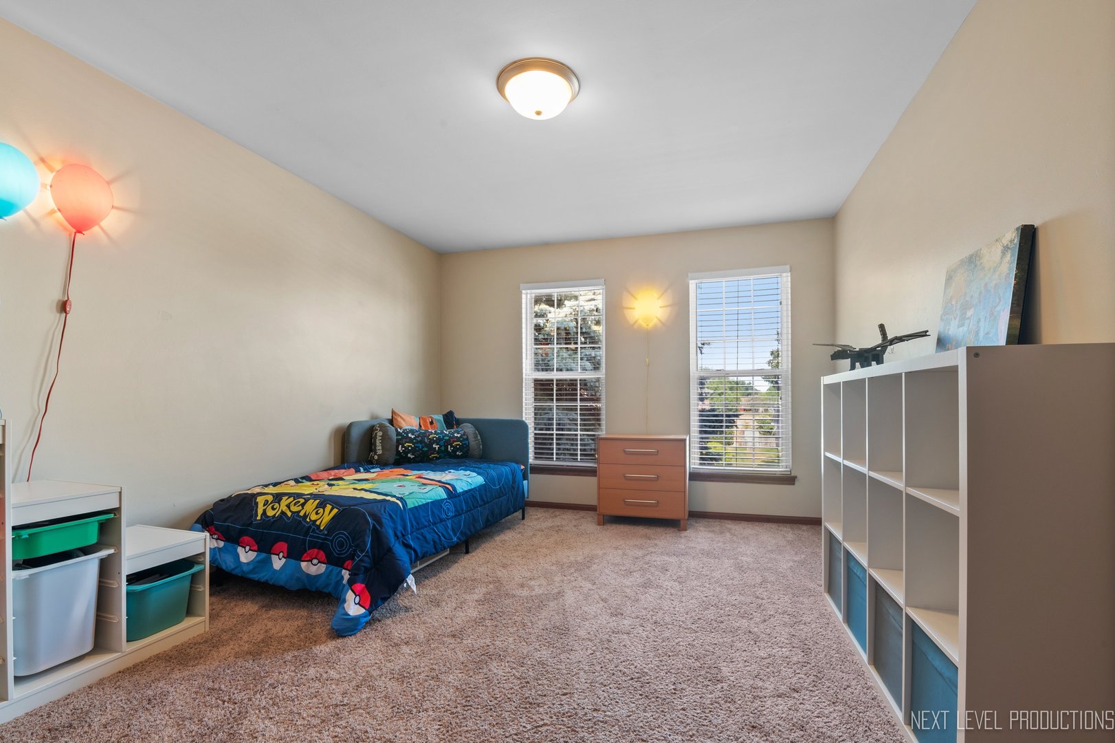 1683 Kautz Road Aurora, IL 60504 - Photo 20 of 26 a bedroom with furniture and a large window