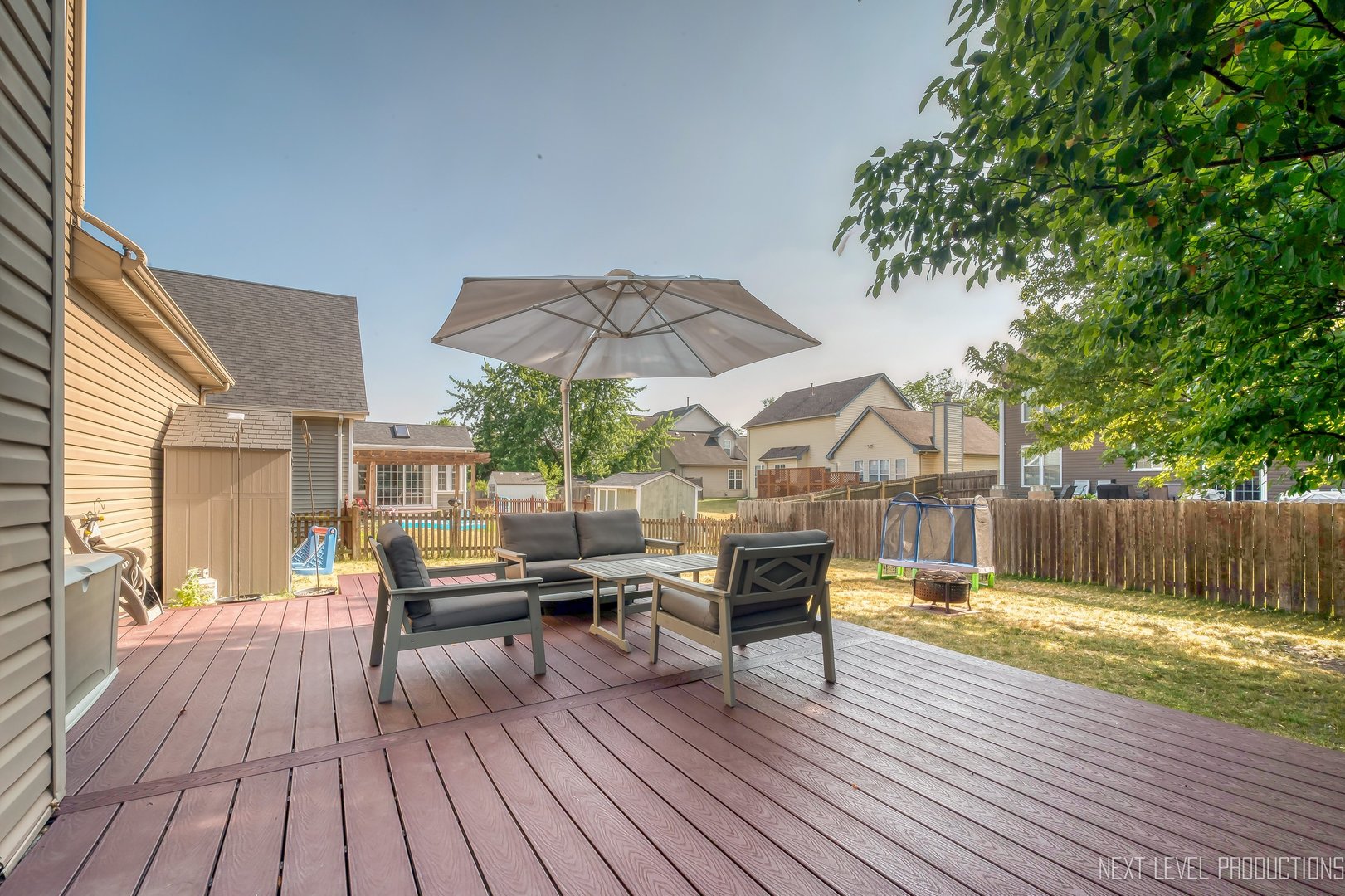 1683 Kautz Road Aurora, IL 60504 - Photo 25 of 26 a view of a house with swimming pool and sitting area