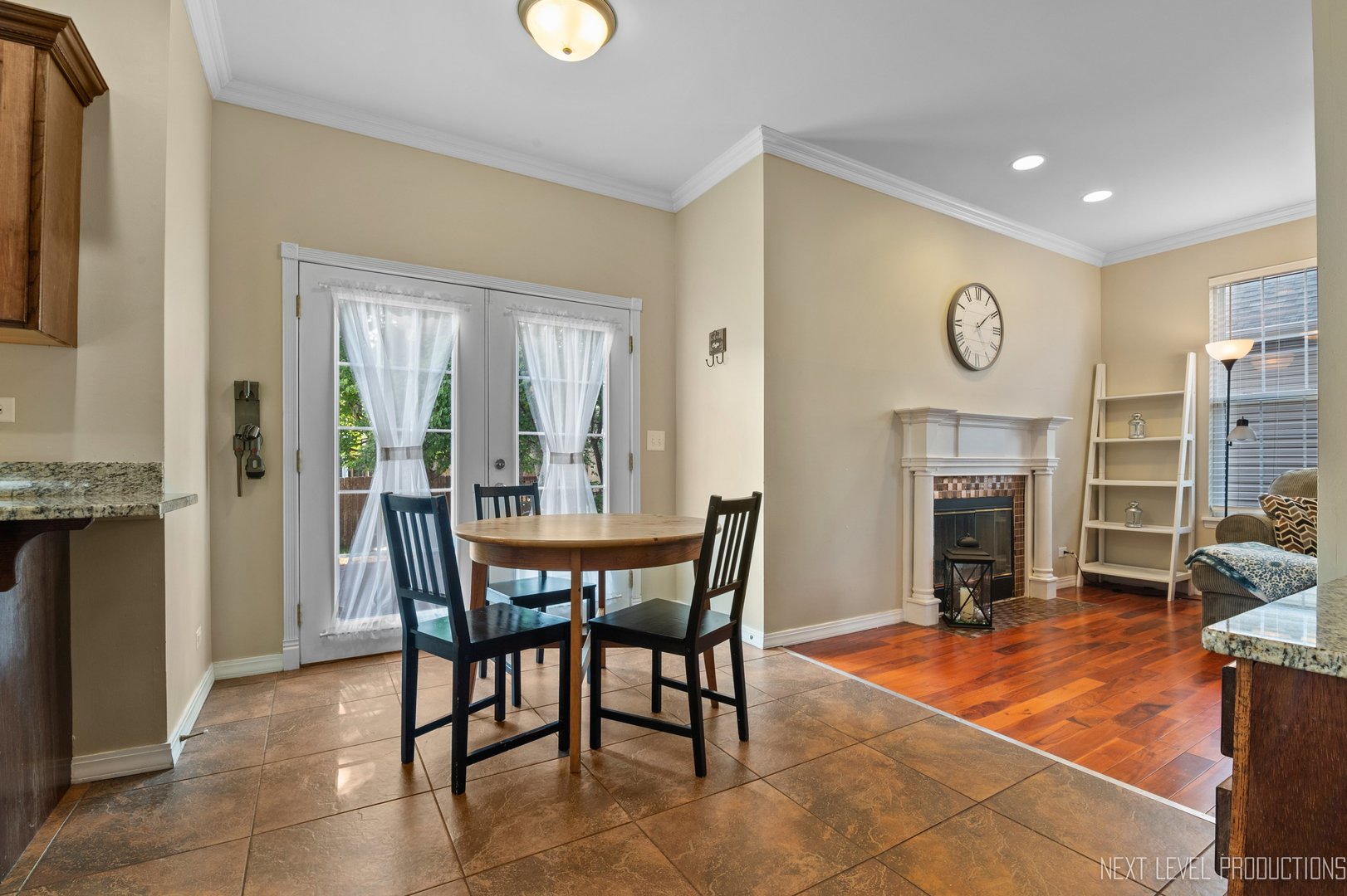 1683 Kautz Road Aurora, IL 60504 - Photo 6 of 26 a dining room with furniture and fireplace