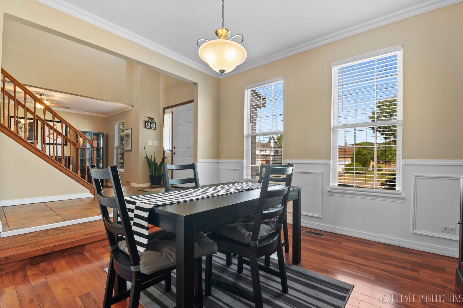 1683 Kautz Road Aurora, IL 60504 - Photo 9 of 26 a view of a dining room with furniture window and wooden floor
