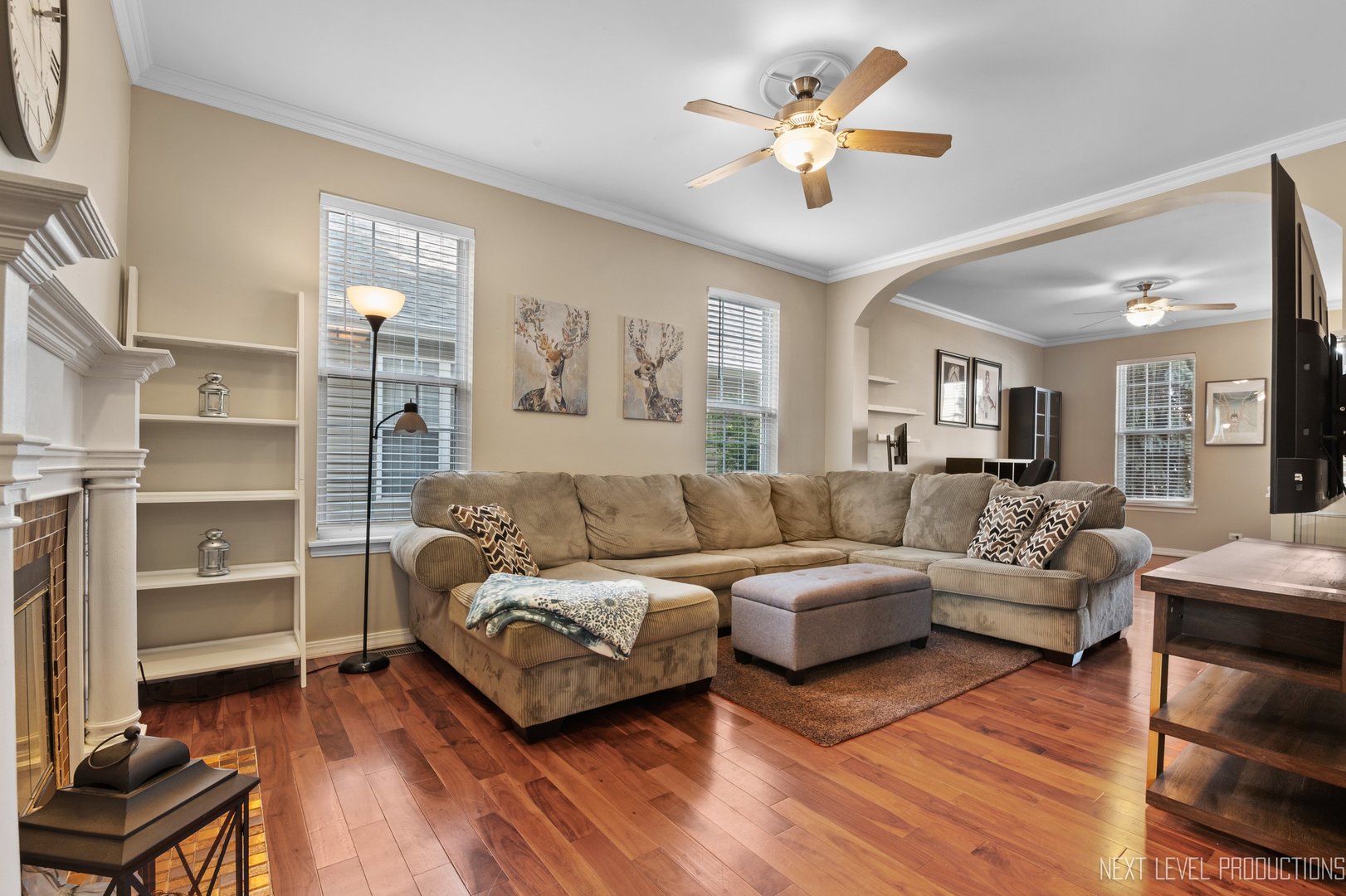 1683 Kautz Road Aurora, IL 60504 - Photo 10 of 26 a living room with furniture and a chandelier