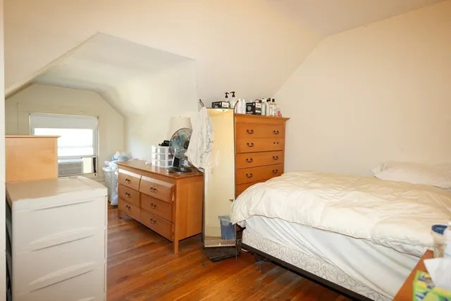 a bathroom with a sink mirror toilet and bathtub