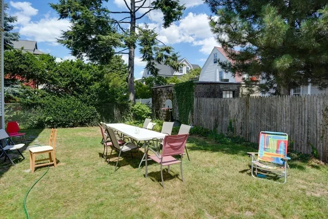 aerial view of a house with street