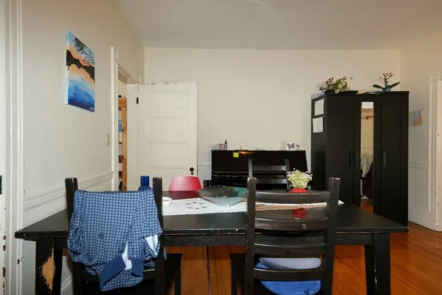 a view of a dining room with furniture