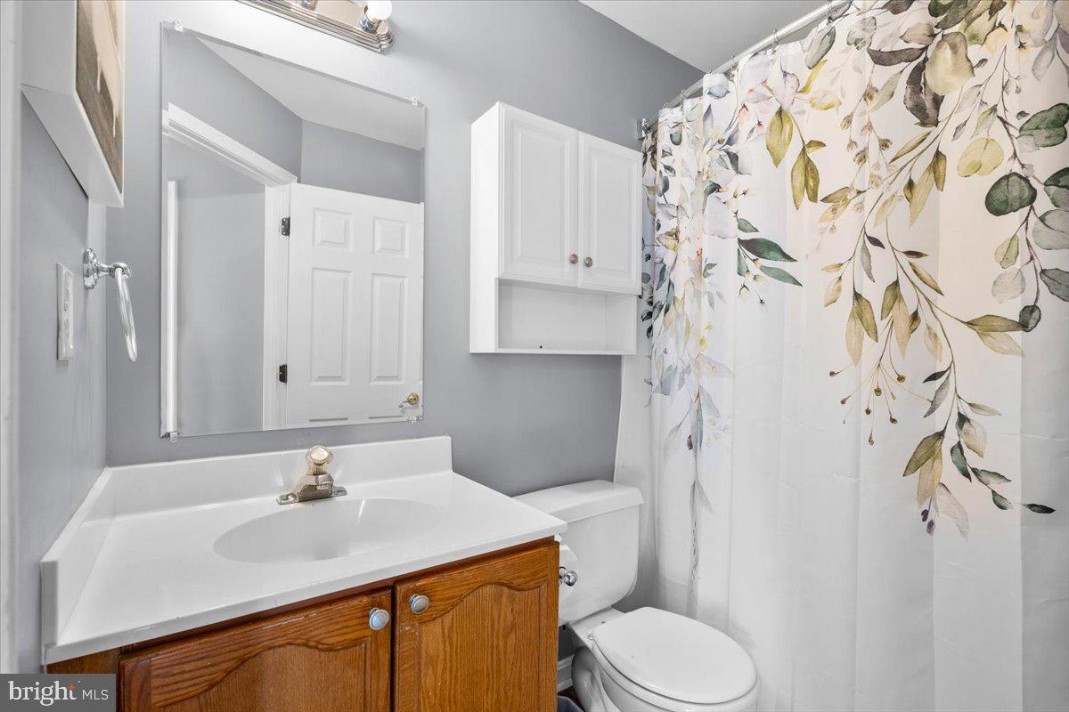 5636 Ashburn Terrace Frederick, MD 21703 - Photo 31 of 44 a bathroom with a sink toilet and shower