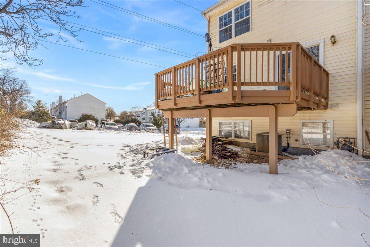 5636 Ashburn Terrace Frederick, MD 21703 - Photo 43 of 44 a view of a house with a yard