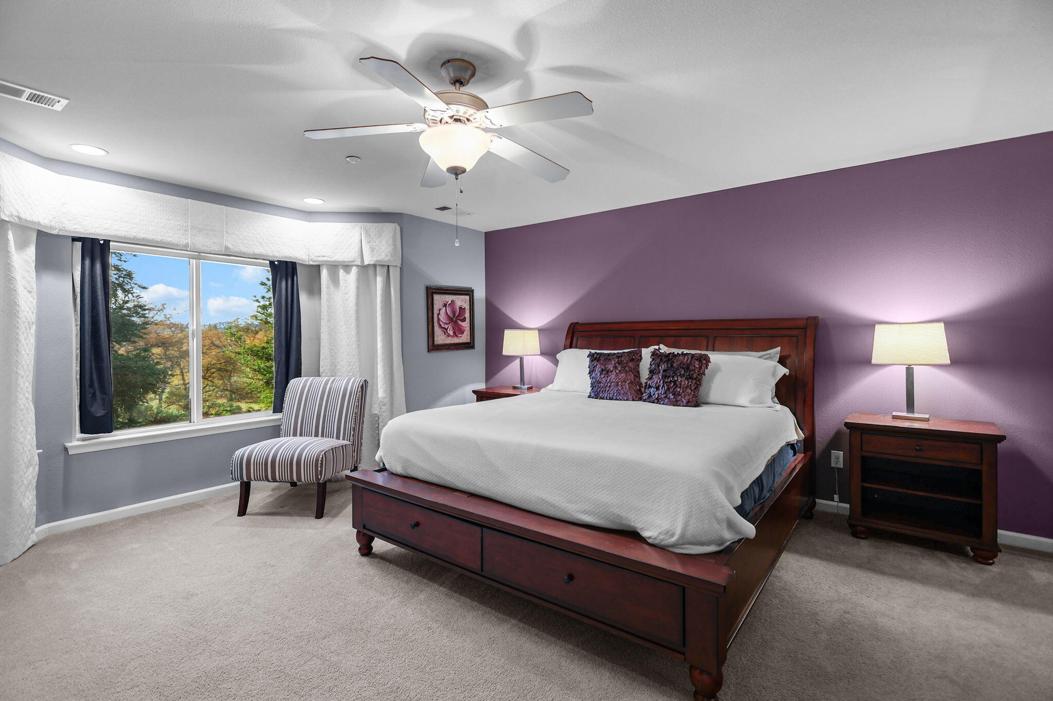 3156 Niklaus Path Redding, CA 96002 - Photo 12 of 34 a bedroom with a bed lamp and window