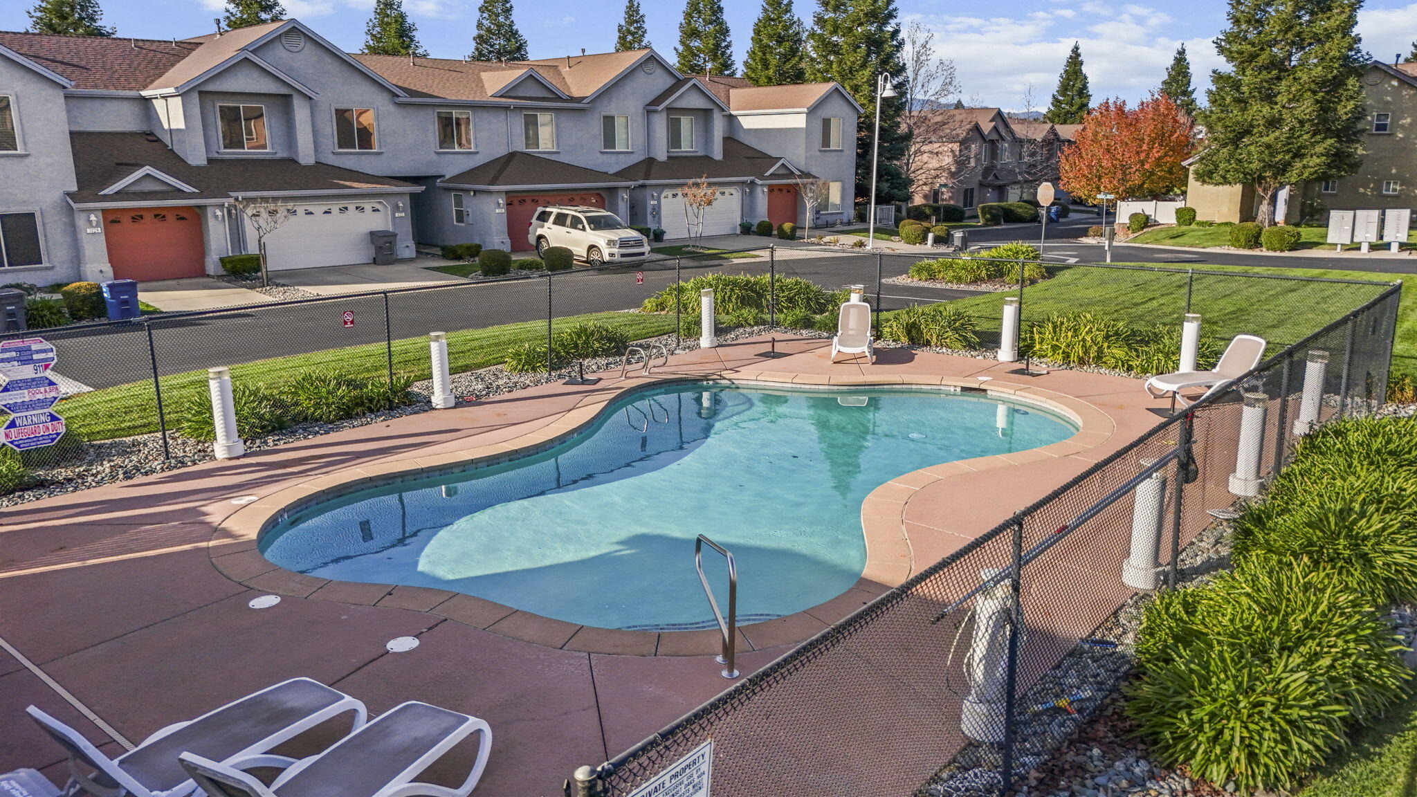 3156 Niklaus Path Redding, CA 96002 - Photo 29 of 34 a view of a swimming pool with a patio