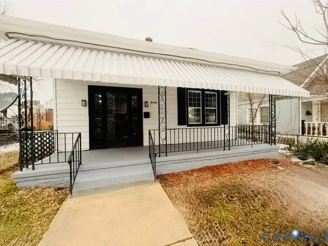 a view of porch with wooden floor and fence