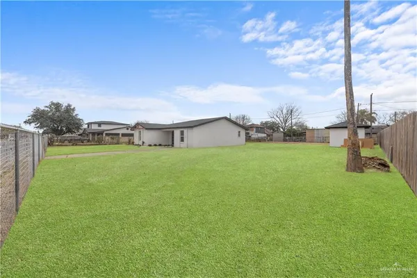 a house view with garden space
