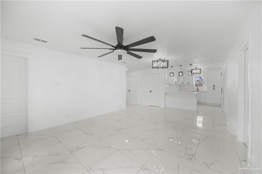 313 West Eller Avenue Pharr, TX 78577 - Photo 5 of 15 wooden floor in an empty room