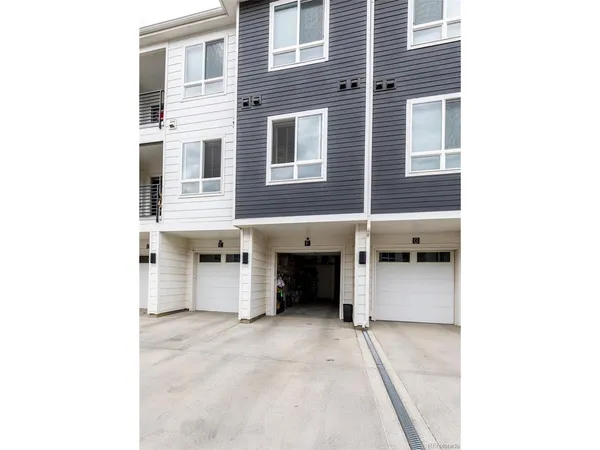 a view of a living room with a large window