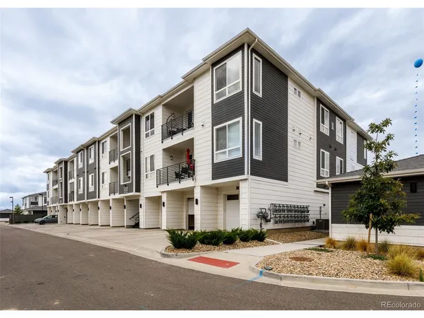 a view of building with yard