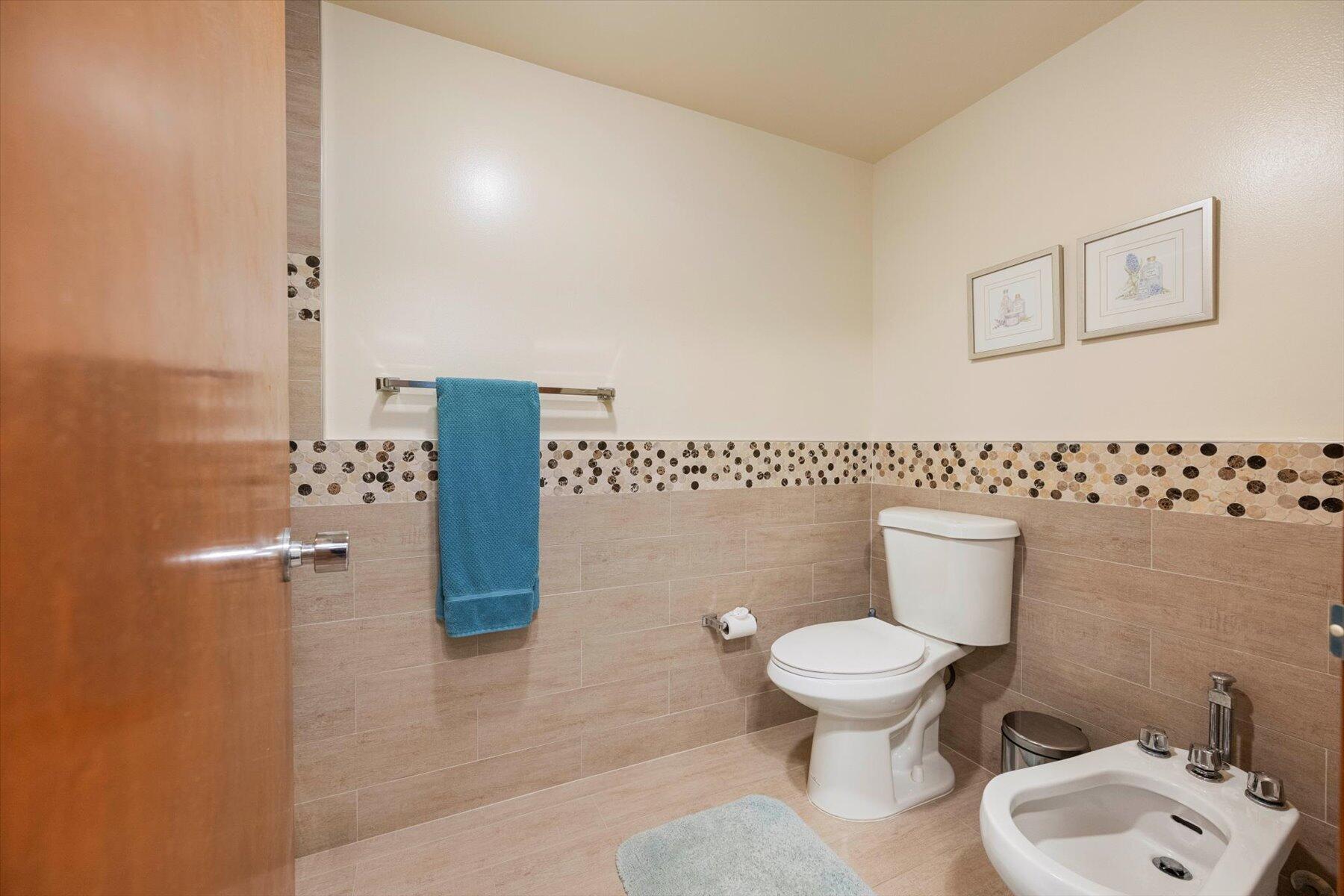 13244 Polo Club Road, Unit C207 Wellington, FL 33414 - Photo 15 of 31 a bathroom with a toilet and a shower