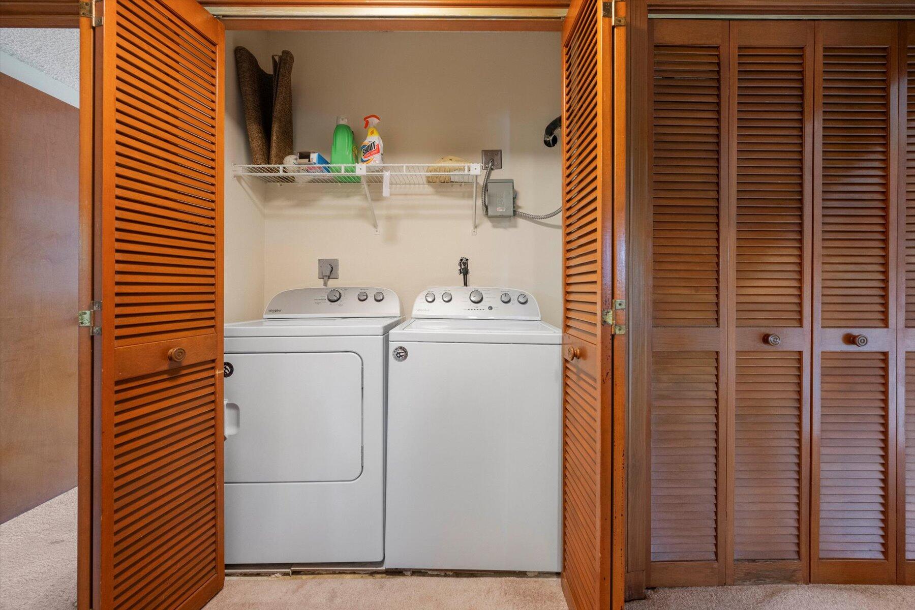 13244 Polo Club Road, Unit C207 Wellington, FL 33414 - Photo 19 of 31 a utility room with dryer and washer