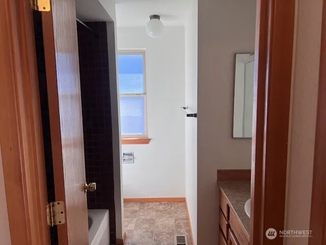 a view of elevator with hallway