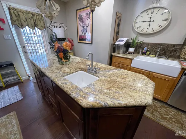 a dining table with chairs and wooden floor