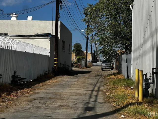 a view of a house with car parked