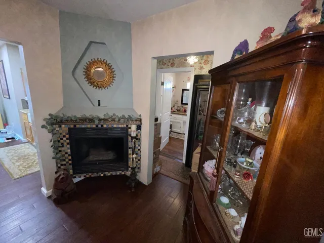 a view of a livingroom with furniture and a fireplace