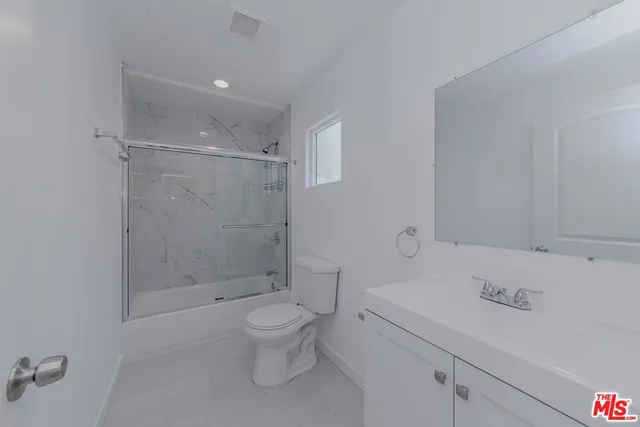 an aerial view of a city with lots of residential buildings