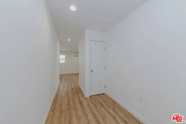 a view of kitchen with wooden floor