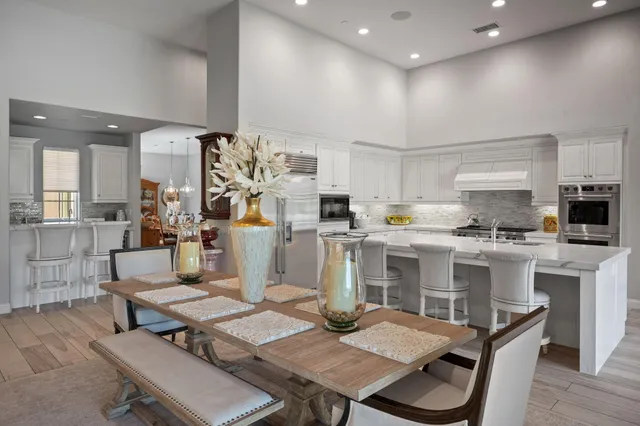 a bathroom with a sink a mirror and vanity