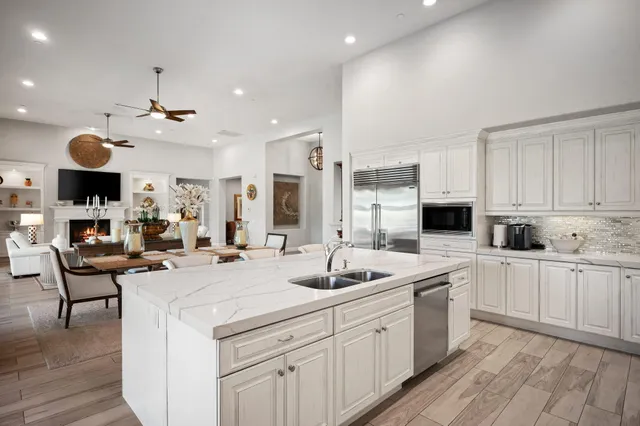 a front view of a house with outdoor seating