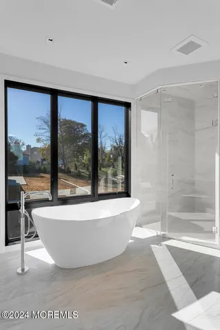 a view of a bathtub in a room