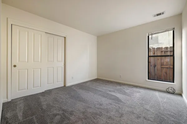 an empty room with window