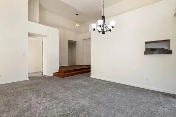 a bathroom with a shower and a glass door
