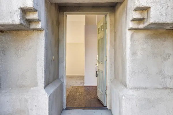 a view of a bathroom from a hallway