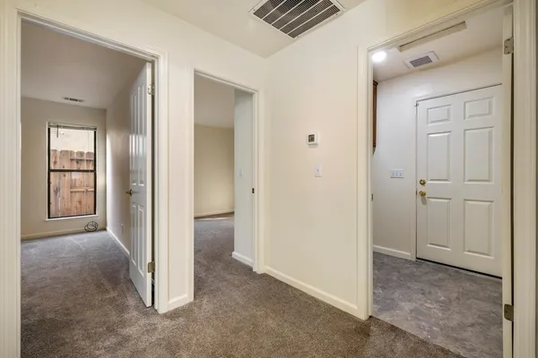a view of a livingroom and front door