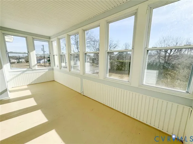 view of an empty room with a window