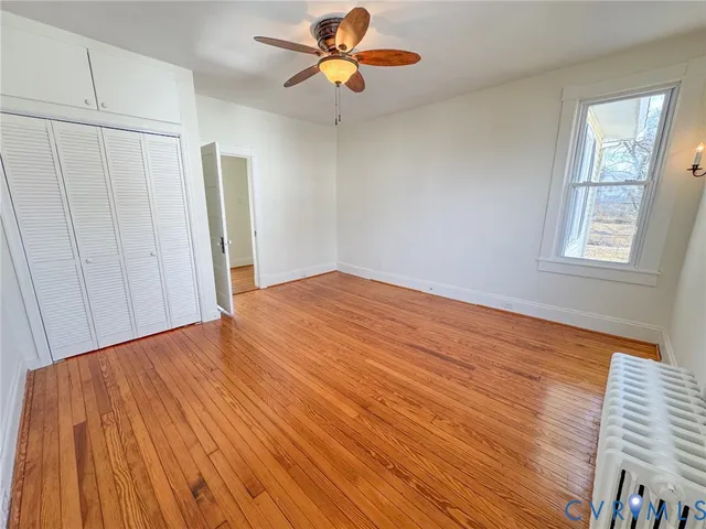 a view of a balcony with wooden floor
