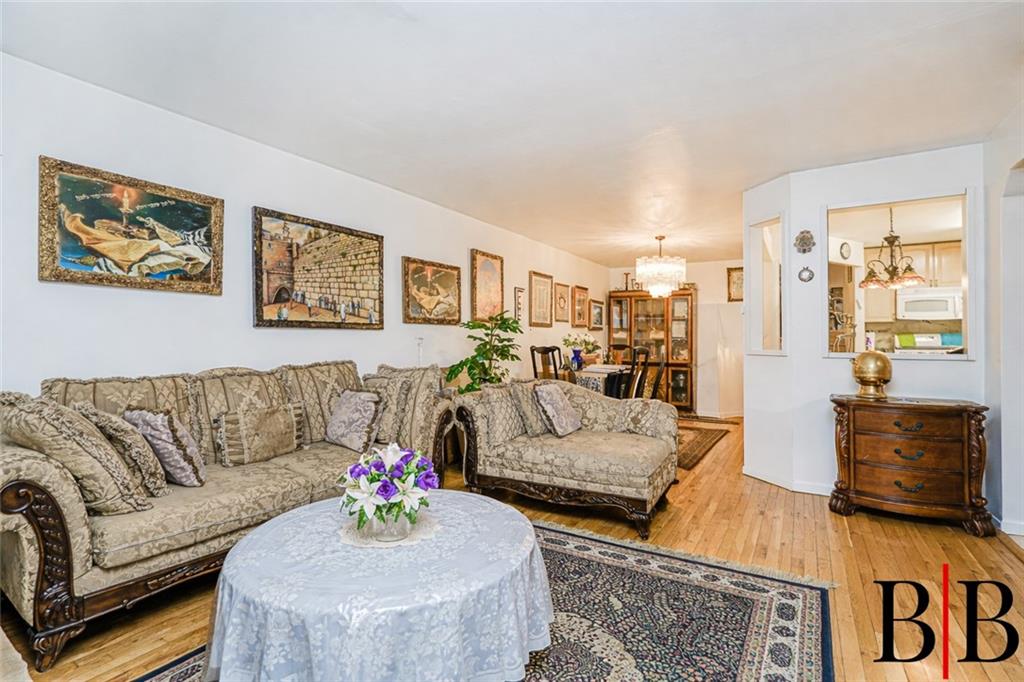 2042 Ralph Avenue Brooklyn, NY 11234 - Photo 3 of 24 a living room with furniture and a couch