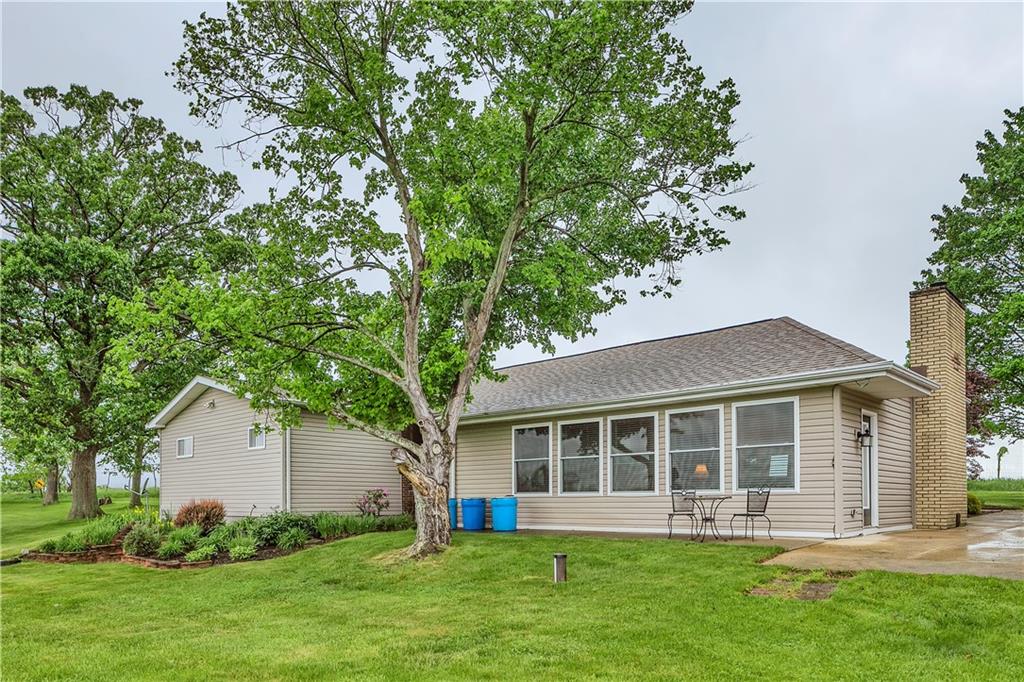 149 Fredericktown Road Midland, PA 15059 - Photo 35 of 50 a front view of a house with a yard and trees