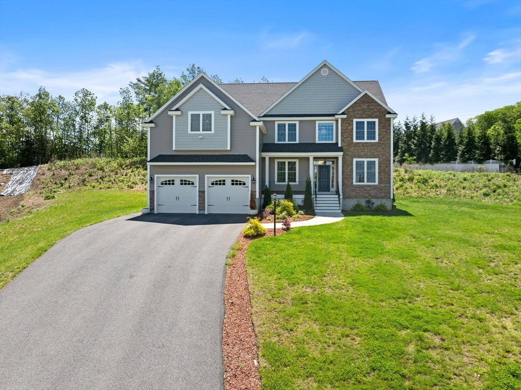 11 Chadwick Road Hudson, MA 01749 - Photo 39 of 39 a front view of a house with garden