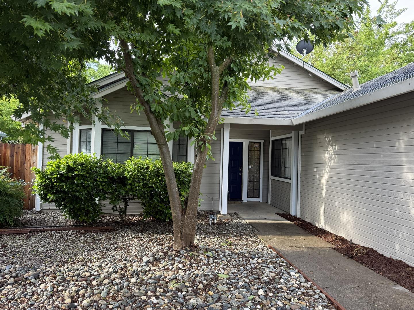 1870 Azurite Way Sacramento, CA 95833 - Photo 2 of 38 a front view of a house with garden
