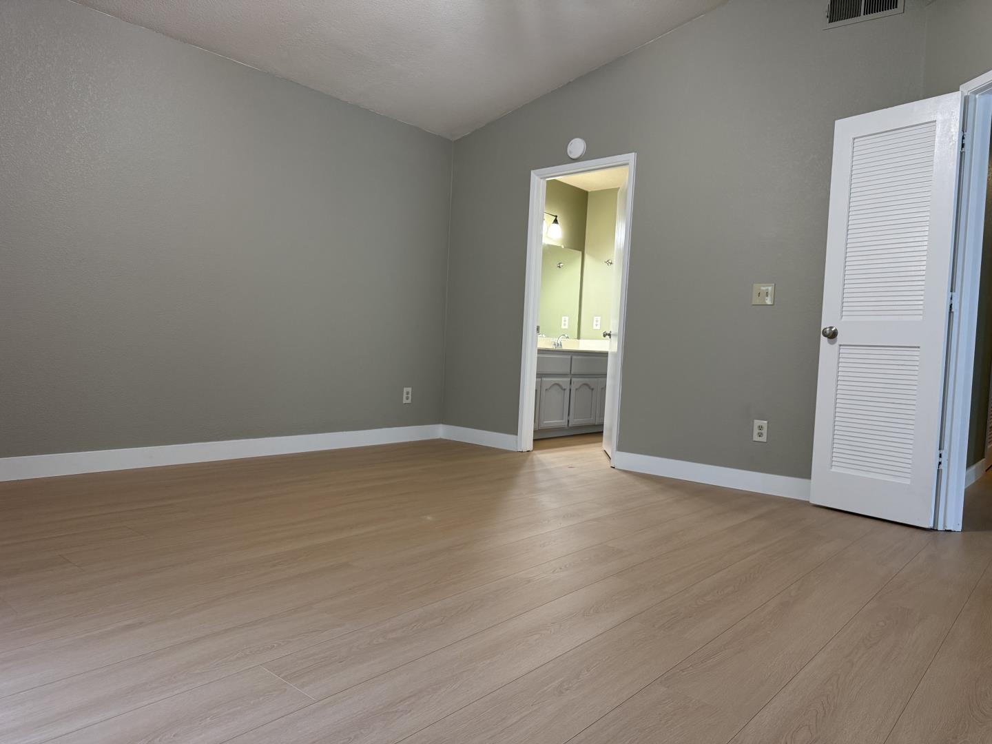 1870 Azurite Way Sacramento, CA 95833 - Photo 22 of 38 an empty room with wooden floor and closet