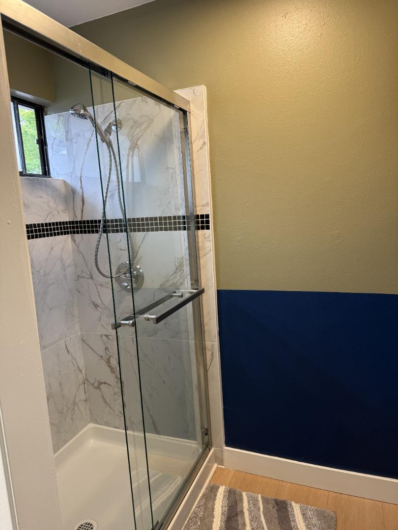 1870 Azurite Way Sacramento, CA 95833 - Photo 26 of 38 a bathroom with a shower