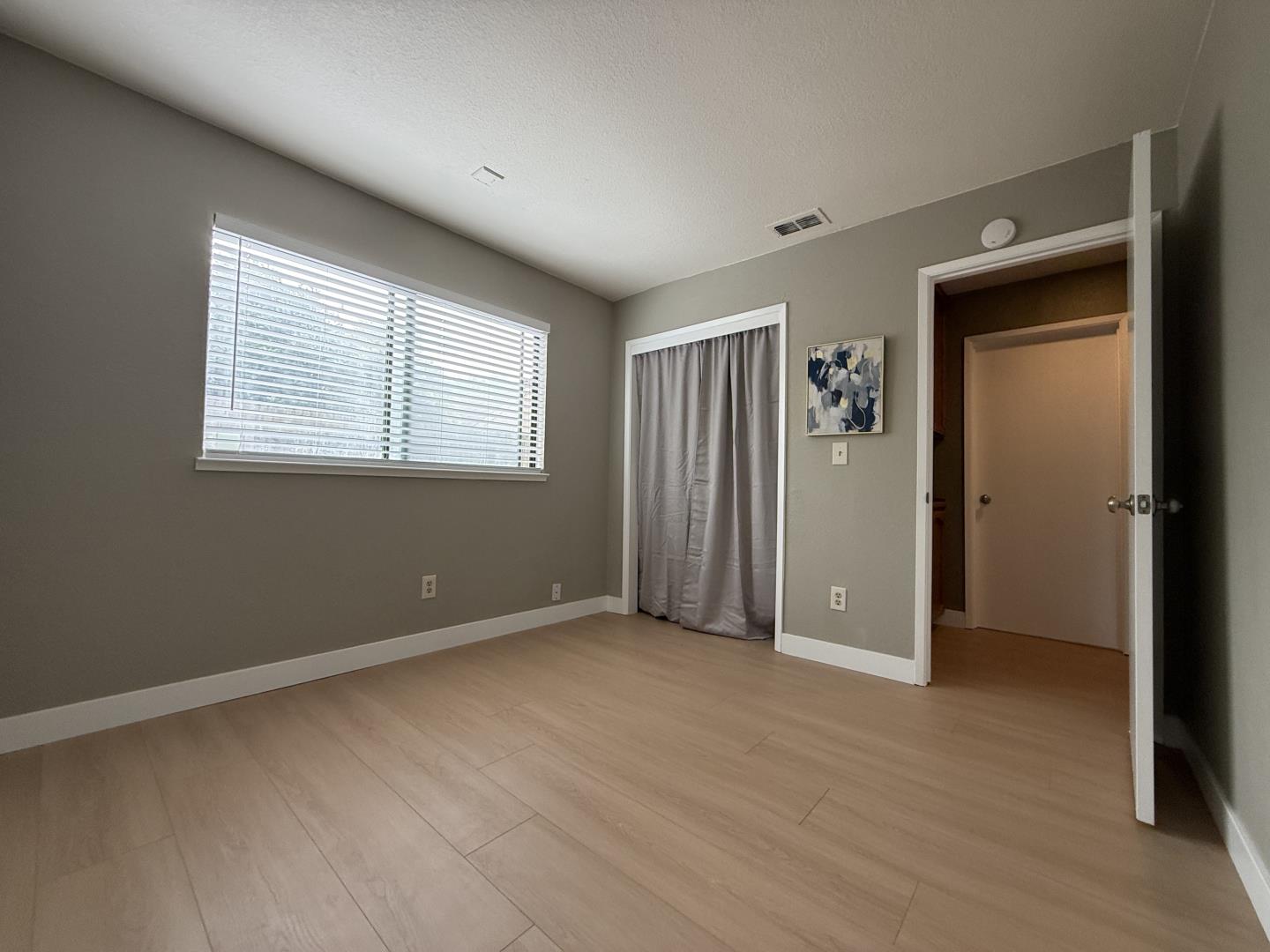 1870 Azurite Way Sacramento, CA 95833 - Photo 30 of 38 an empty room with windows and closet