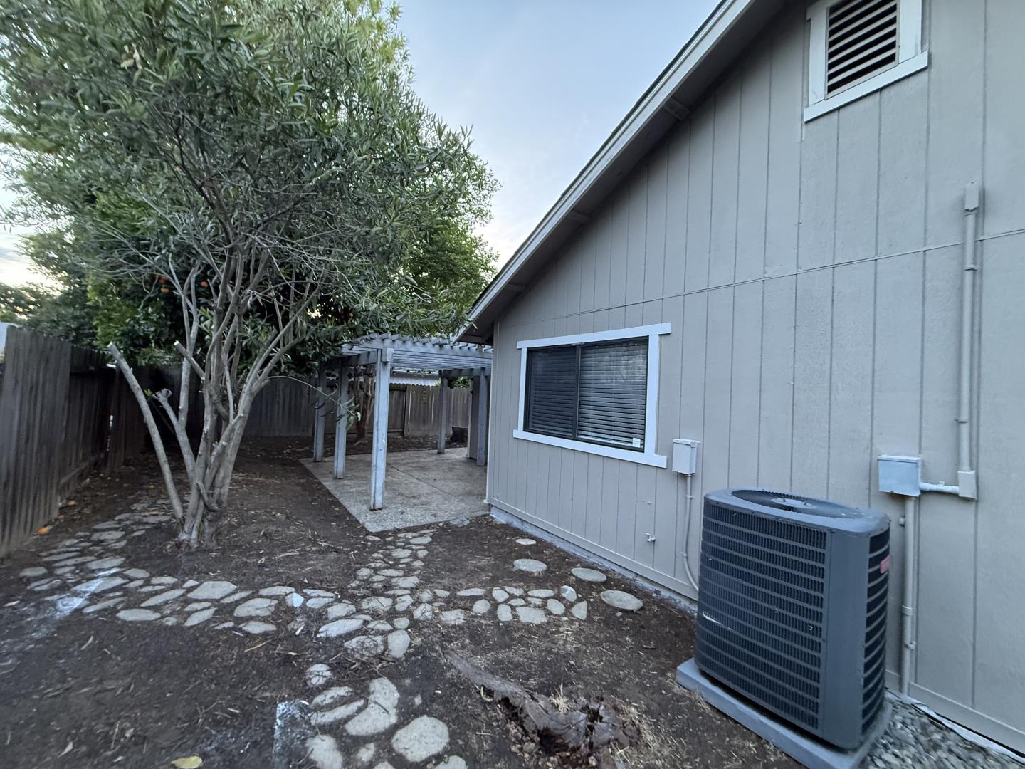1870 Azurite Way Sacramento, CA 95833 - Photo 37 of 38 a backyard of a house with table and chairs