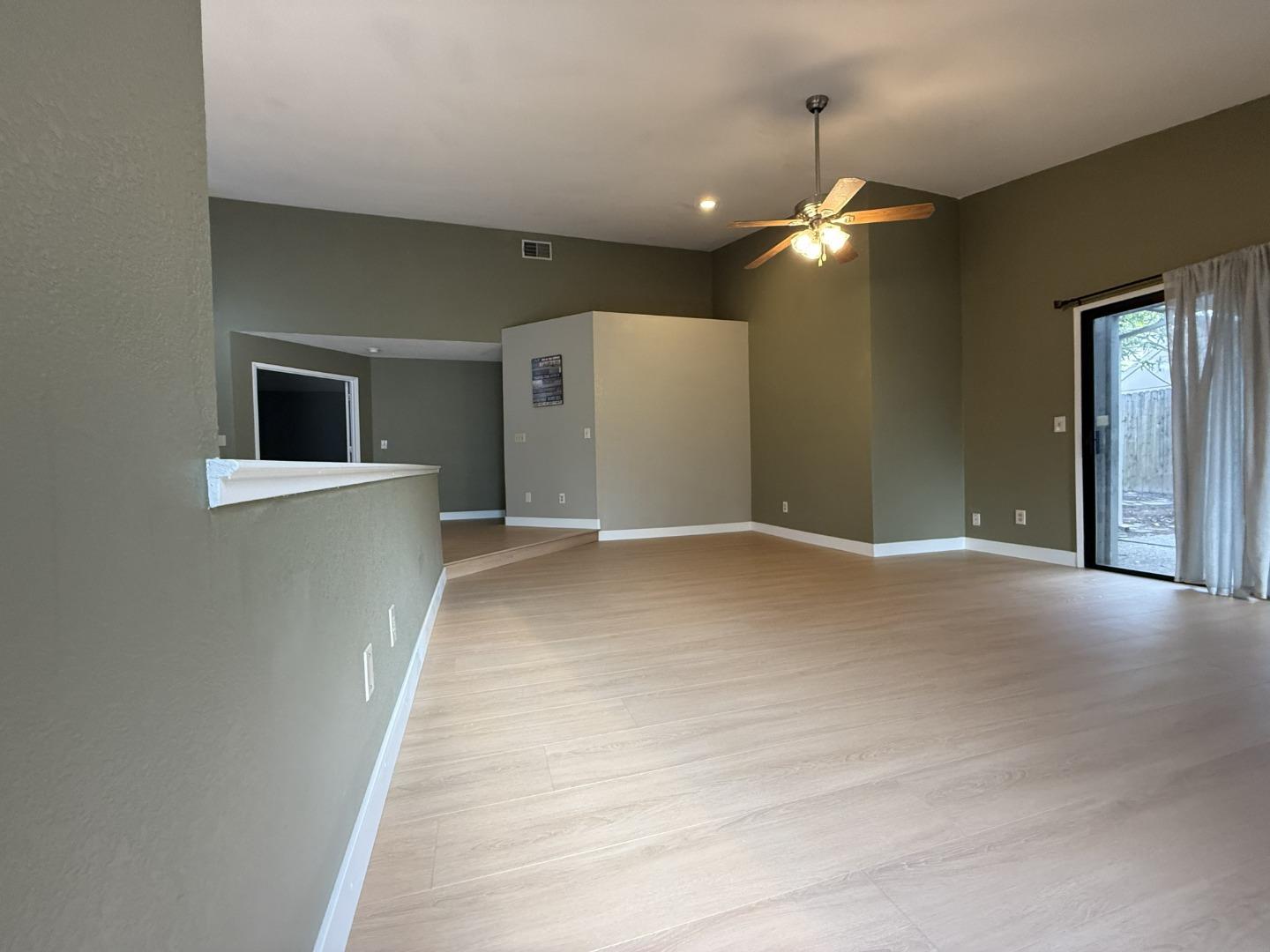 1870 Azurite Way Sacramento, CA 95833 - Photo 7 of 38 a view of a livingroom with a ceiling fan and window