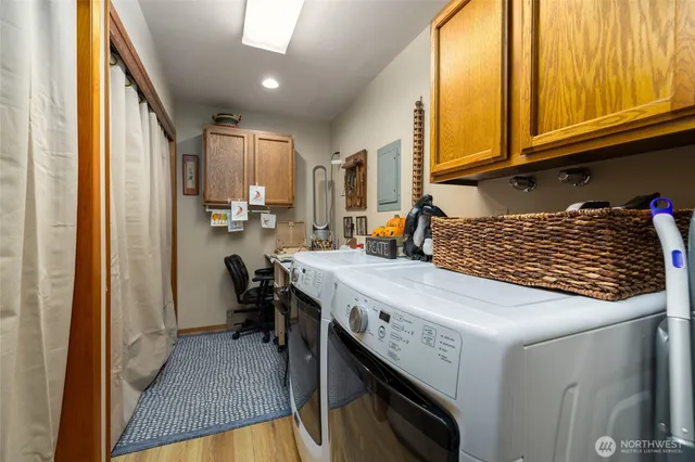 a kitchen with a sink a stove and a refrigerator
