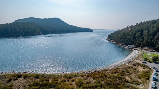 an aerial view of a house with outdoor space