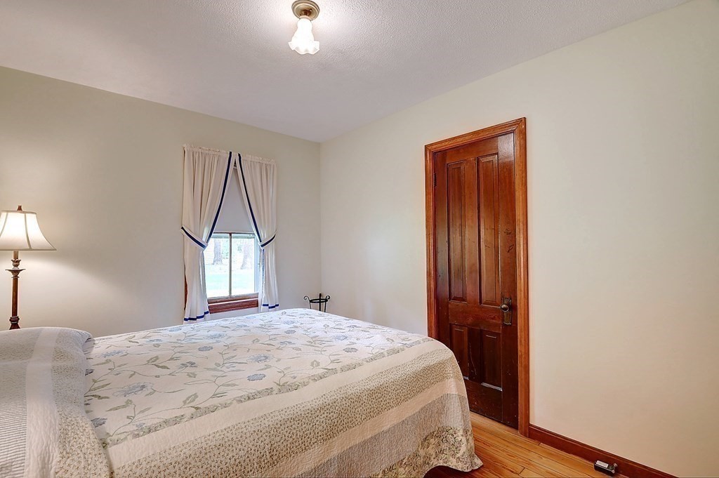 20 Old Acres Road Holland, MA 01521 - Photo 15 of 36 a bedroom with a bed and a window
