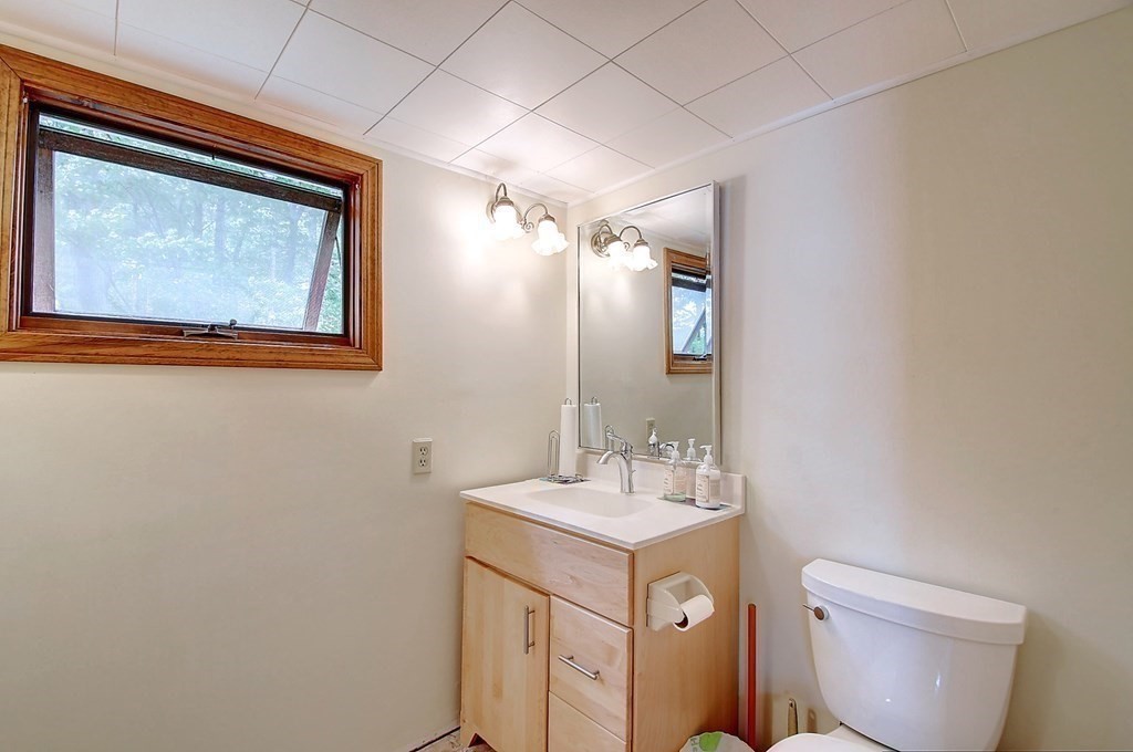 20 Old Acres Road Holland, MA 01521 - Photo 18 of 36 a bathroom with a toilet sink and mirror