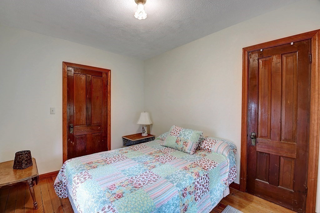 20 Old Acres Road Holland, MA 01521 - Photo 20 of 36 a bedroom with a bed and a closet