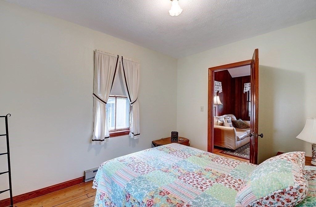 20 Old Acres Road Holland, MA 01521 - Photo 21 of 36 a bedroom with a bed and a window