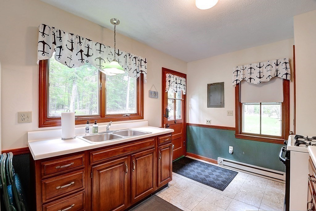 20 Old Acres Road Holland, MA 01521 - Photo 7 of 36 a bathroom with a sink mirror and a bathtub